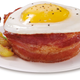 Illustration for article titled Which of these kitchen gadgets is best for makin’ bacon?